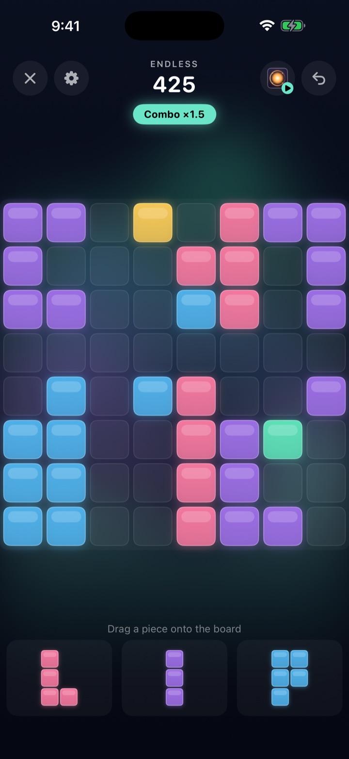 A Kajai game in progress: glowing blocks in blue, purple, pink and amber on the board, a live combo, and three pieces waiting in the tray.